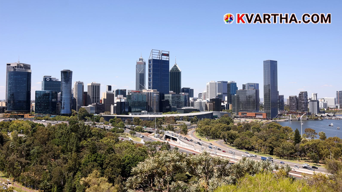 Aerial view of Perth city showing its modern skyscrapers and the Indian Ocean.