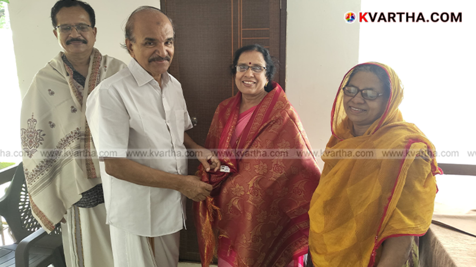 Kookanam Rahman with former student Yashoda and her husband Mohanan