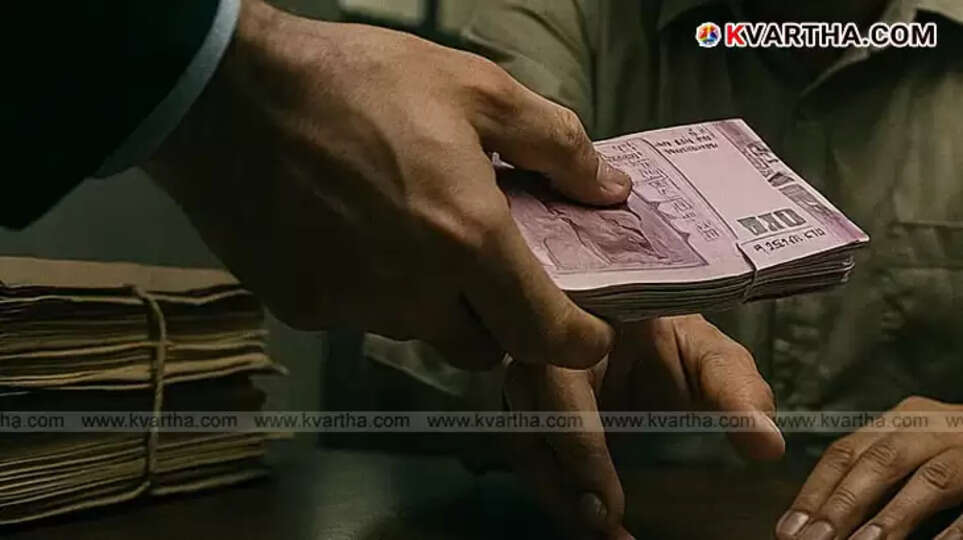 Two individuals being apprehended by Vigilance officials.