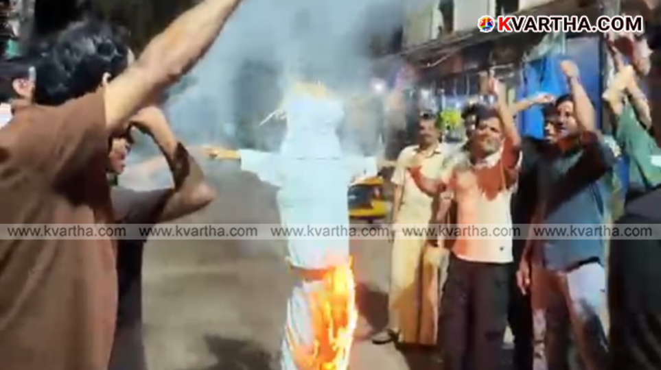Activists burn the effigy of a Muslim League leader in Panur.