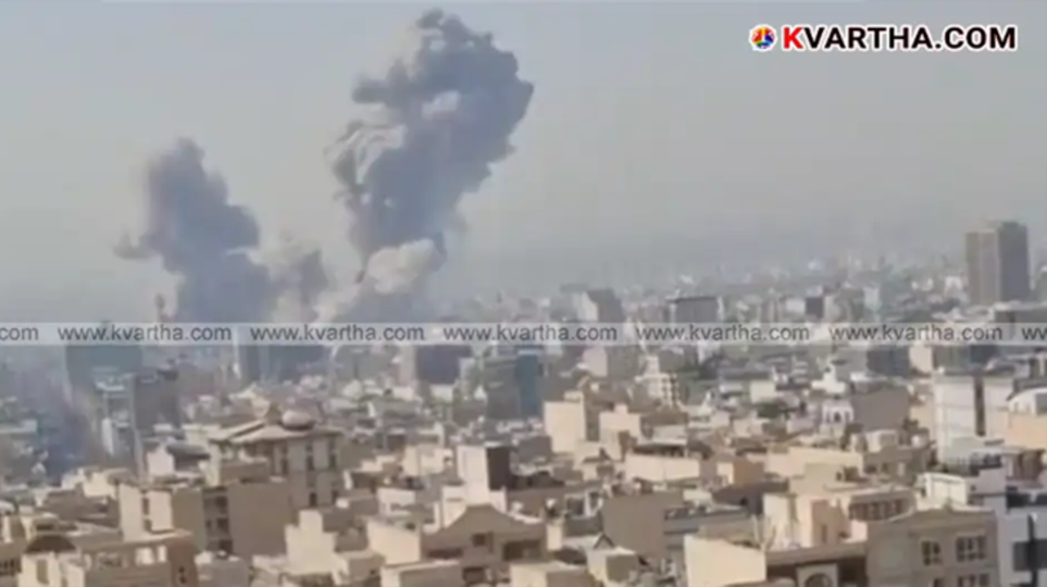  Aftermath of a missile strike in an Iranian city showing smoke and rubble.