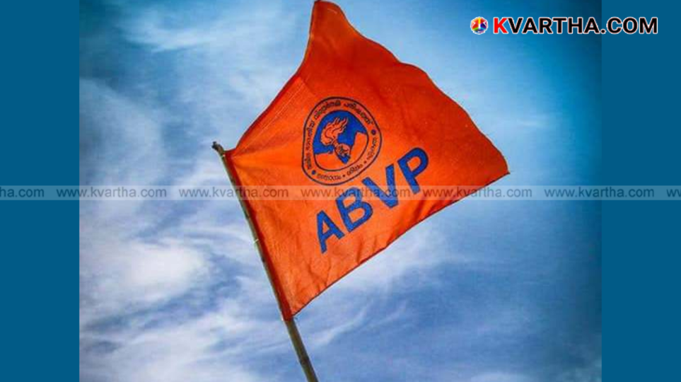 Students protesting in Odisha, holding placards demanding justice.