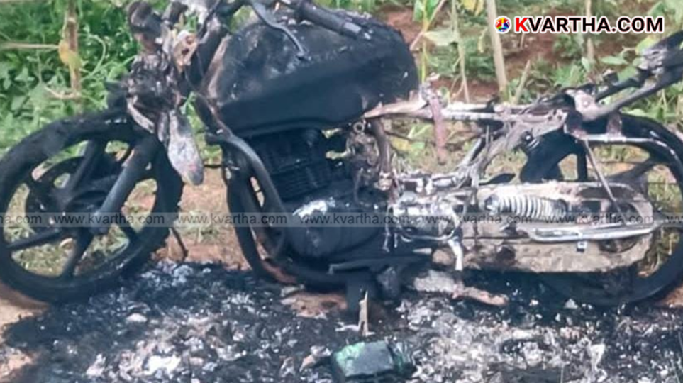 A burnt bike in a field in Payyannur.
