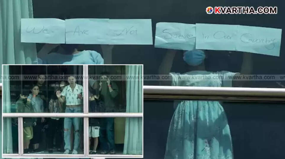 Migrants seeking help in Panama with posters