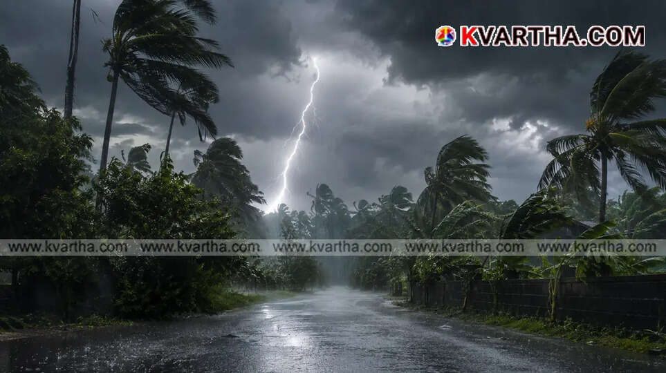  Heavy rain pouring over a city street in Kerala indicating monsoon weather
