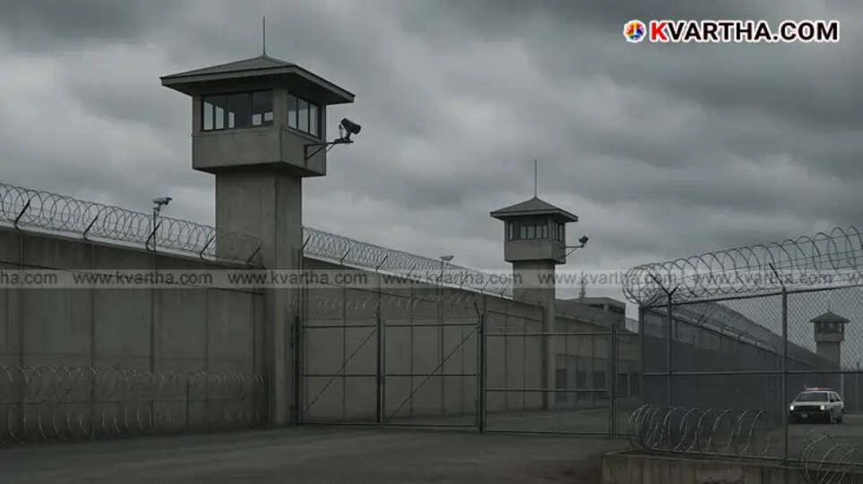 A generic image of a prison wall with barbed wire, symbolizing prison escapes and security.