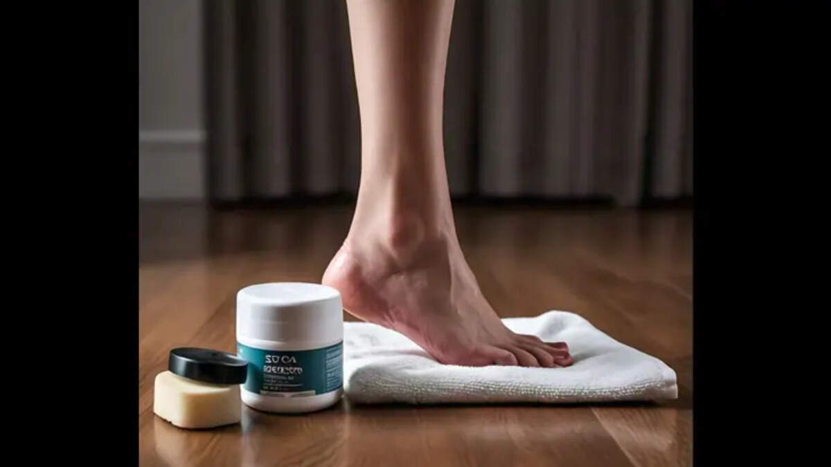 A person soaking their feet in a foot bath
