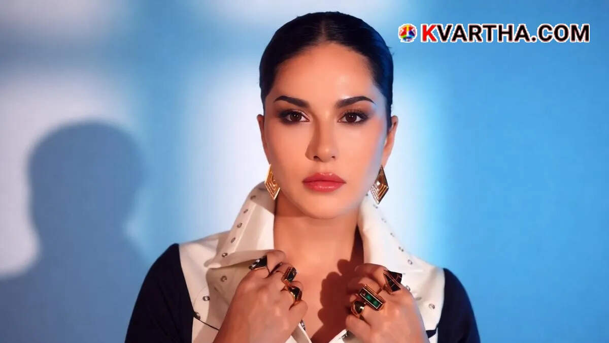 Bollywood actress Sunny Leone posing for a photograph during a promotional event