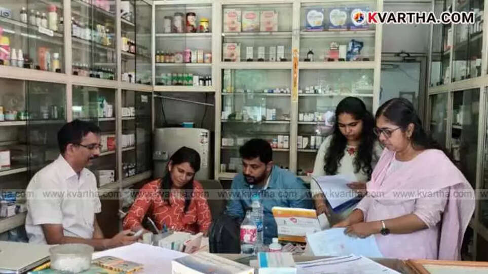 Drugs Control Department officials conducting a raid and inspection.