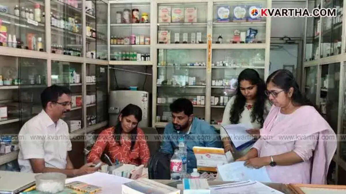 Drugs Control Department officials conducting a raid and inspection.
