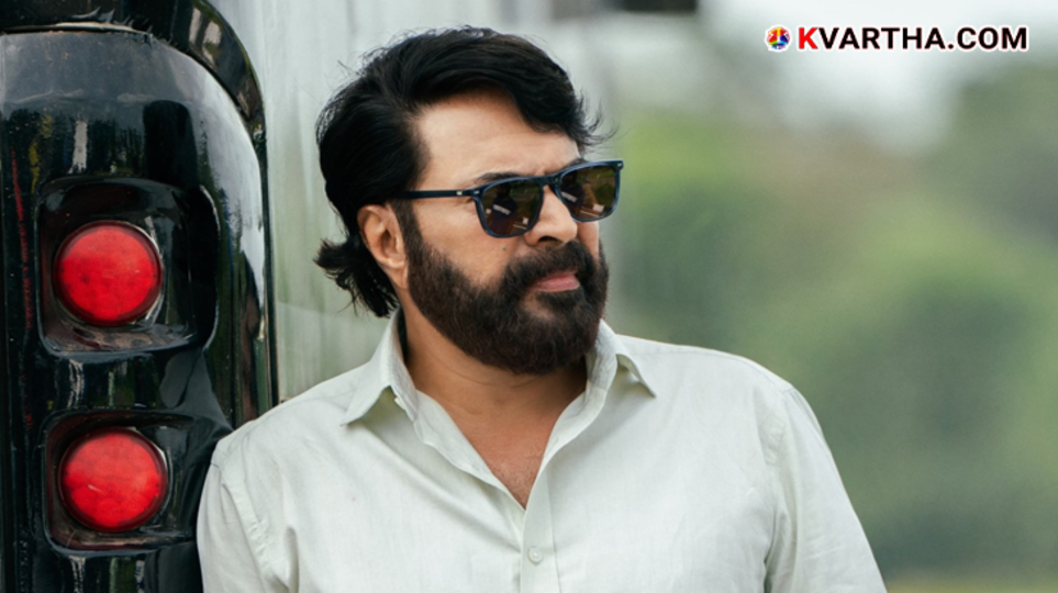 Actor Mammootty wearing a mask and casual attire at the Wayanad rehabilitation site