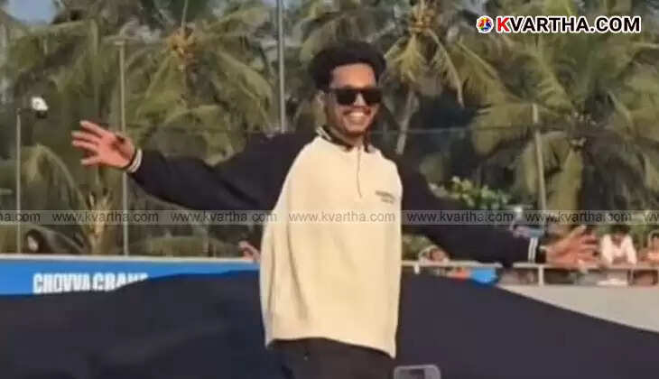 Sarin posing with his handcrafted yellow miniature Lamborghini car.