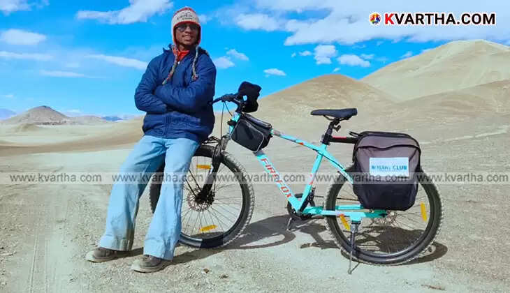 Cyclist Nithin receiving a cycle gift from Congress workers in Ladakh.