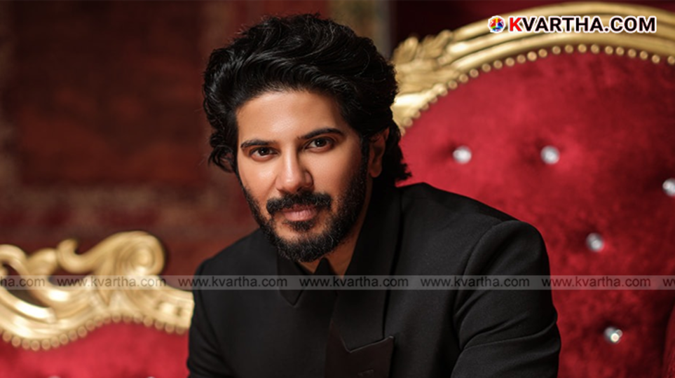 image of actor Dulquer Salmaan with a luxury car.