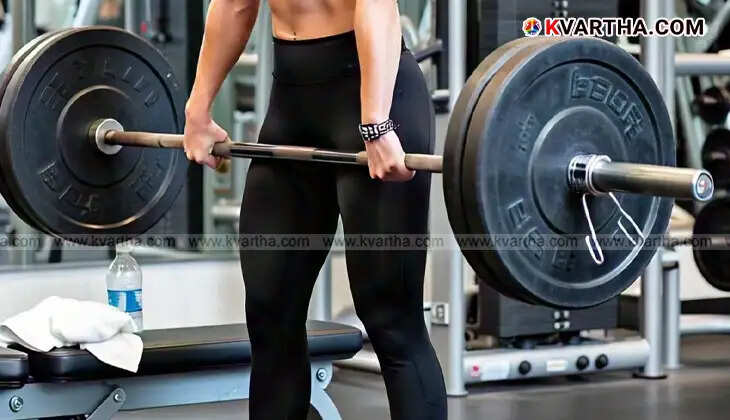 An athlete competing in weightlifting at the Olympics.