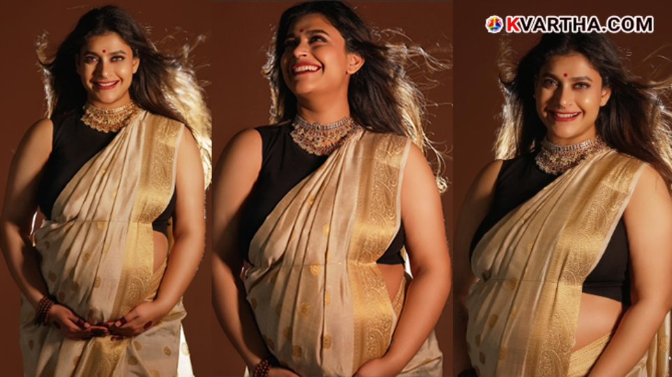Actress Parvathy Nambiar in a beautiful saree during her maternity photoshoot.