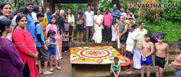 A unique floating pookalam arranged in a swimming pool in Kannur.