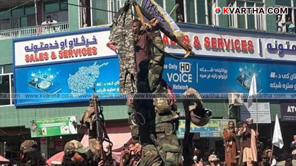 Afghan fighters displaying trousers after border conflict