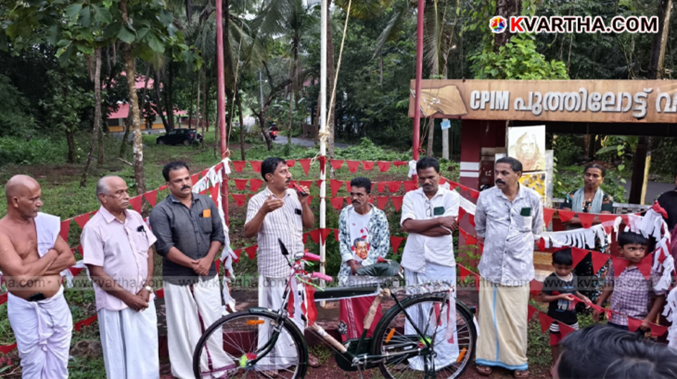 Rajan Cheguvera receiving a new bicycle