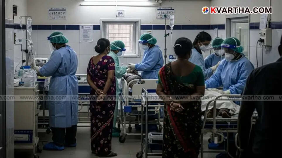 Health workers in protective gear, Nipah prevention in Kerala.