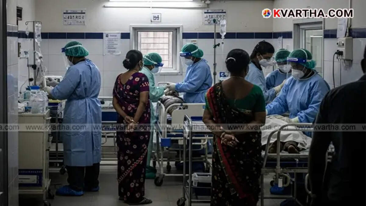 Health workers in protective gear, Nipah prevention in Kerala.