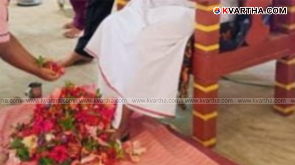 Students performing Padapuja on Guru Purnima in Kannur school.