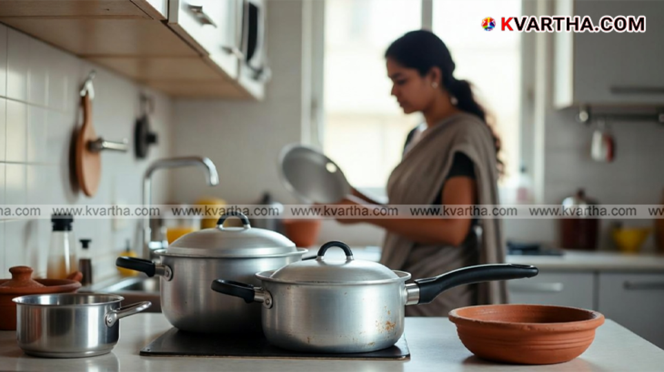 Old and scratched aluminum cooking pots on a gas stove.