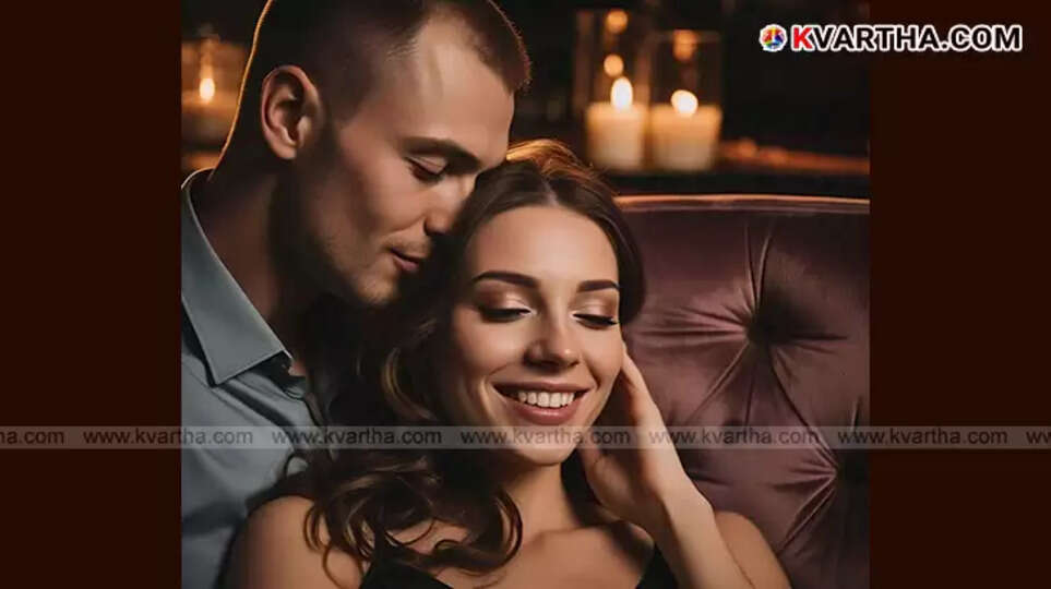 Close-up of a gentle kiss on an ear.