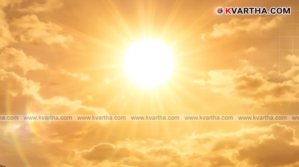 People in Kerala using umbrellas and drinking water during the 2026 heatwave.