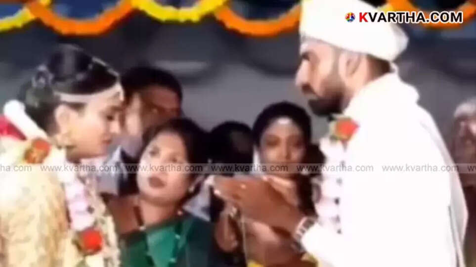 Screenshot from the viral wedding video showing the bride and groom.
