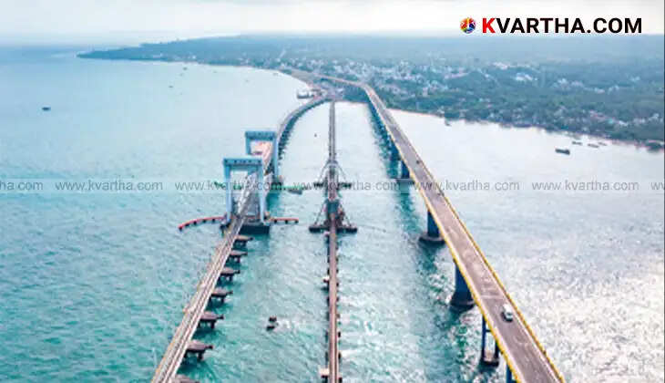 Panoramic view of the new Pamban Railway Bridge, with train crossing over the sea.