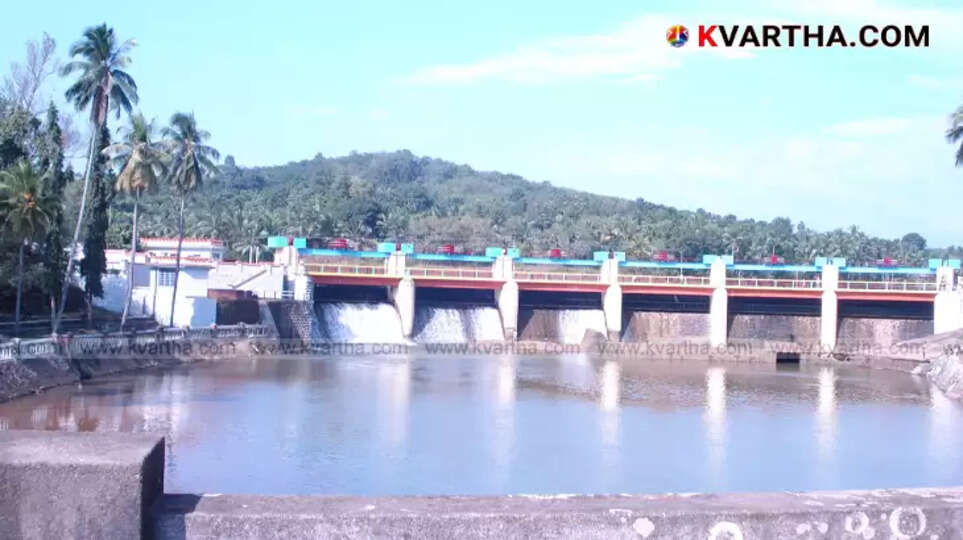 Aruvikkara Dam in Thiruvananthapuram with water flowing.