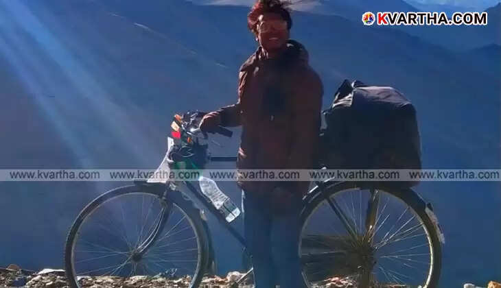Cyclist Nithin receiving a cycle gift from Congress workers in Ladakh.