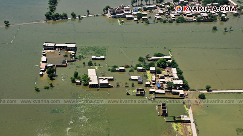 India and Pakistan flag with flood image in background
