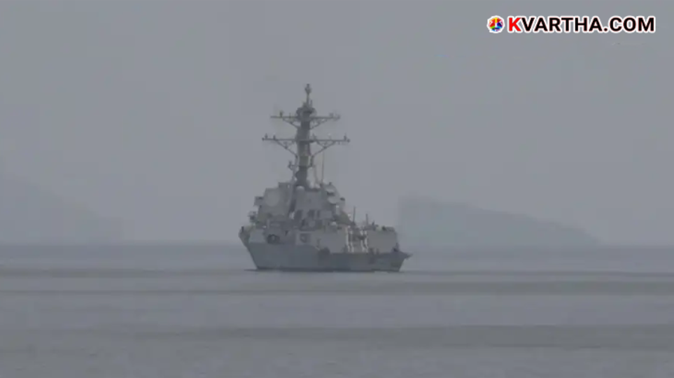 A symbolic view of American warships and oil tankers stationed in the Strait of Hormuz.