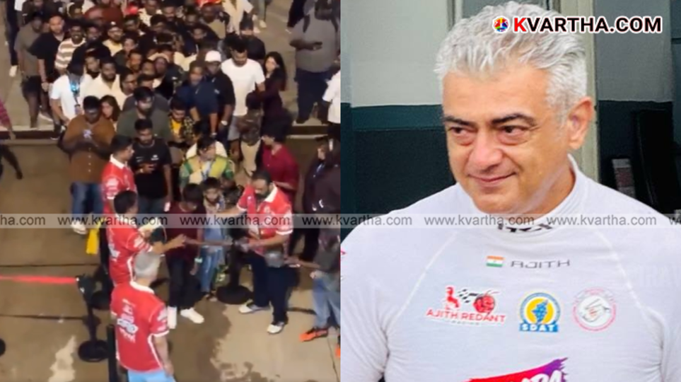  Actor Ajith Kumar surrounded by a large fan crowd at a racing track for photos.