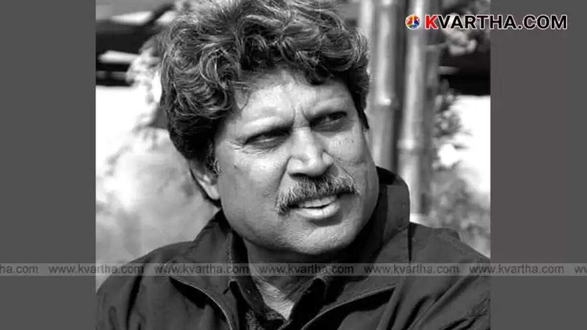 Kapil Dev holding the 1983 Cricket World Cup trophy.