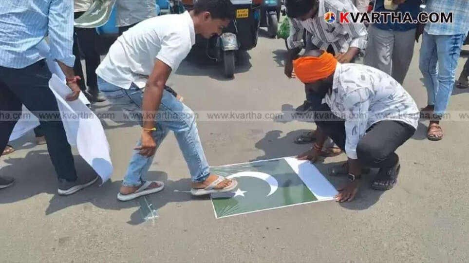 Pakistan flag stickers pasted on a road in Kalaburagi.