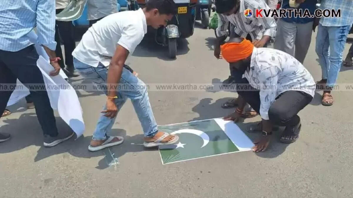 Pakistan flag stickers pasted on a road in Kalaburagi.