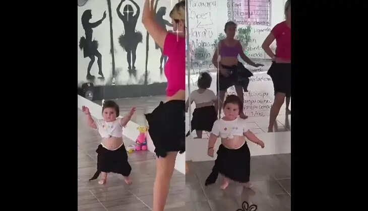 A 1.5-year-old baby girl performing a belly dance.