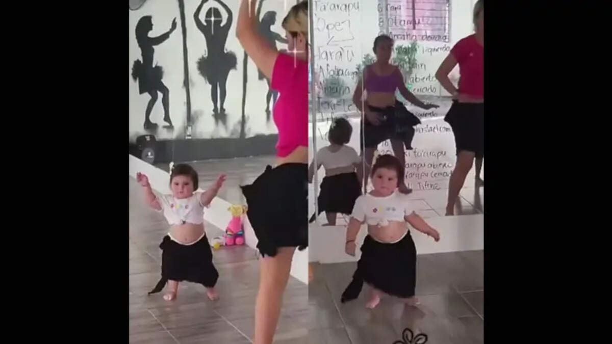 A 1.5-year-old baby girl performing a belly dance.