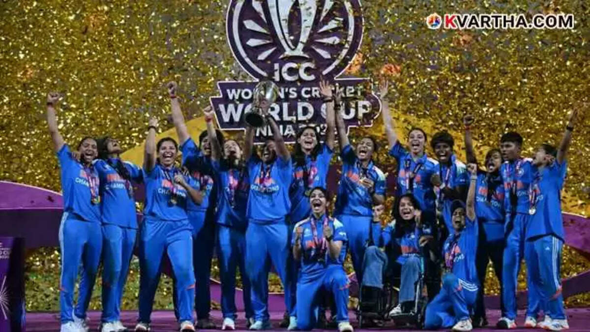 Indian women's cricket team members celebrating with the ICC World Cup 2025 trophy.