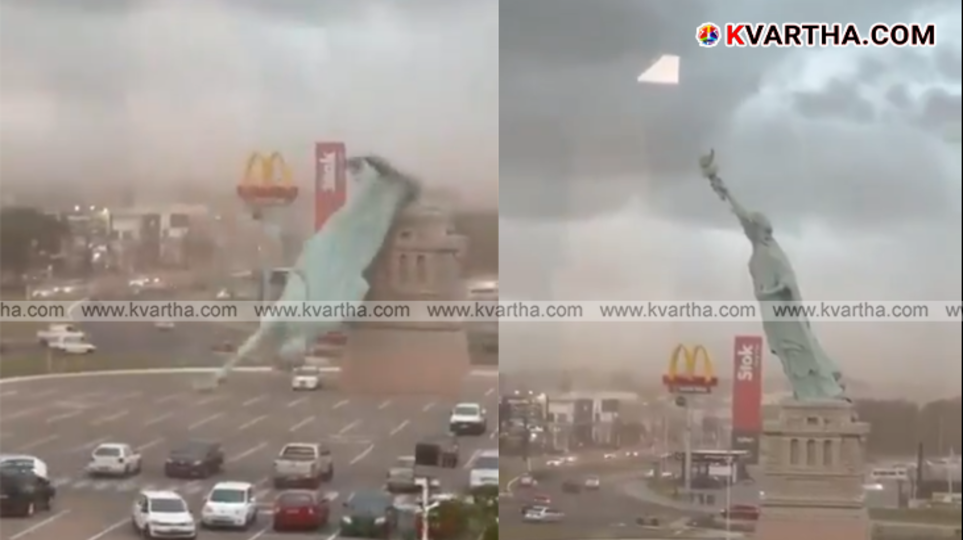 Collapsed Statue of Liberty replica in Gua&iacute;ba, Brazil