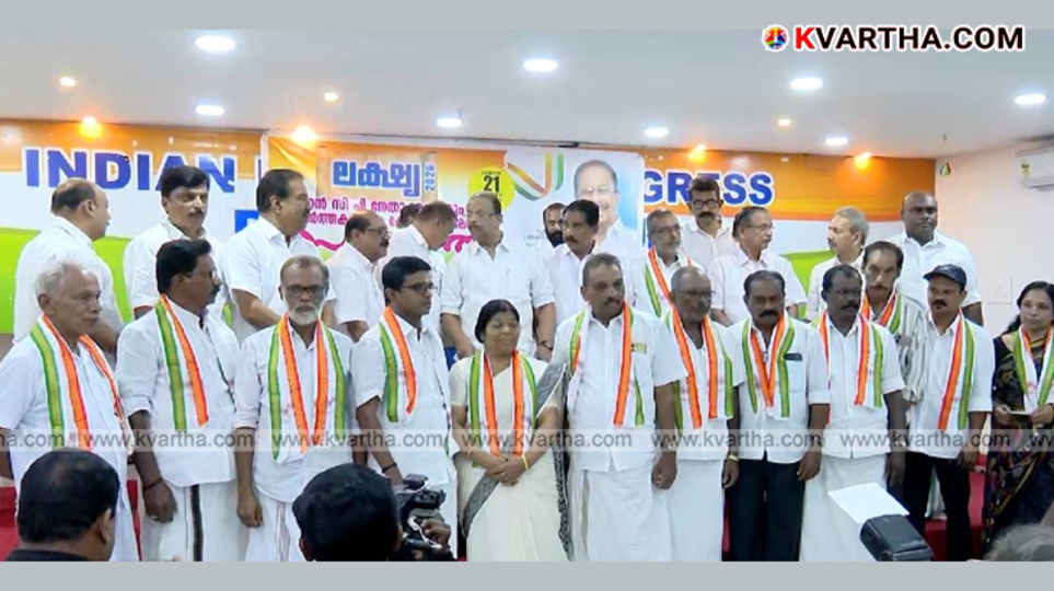 K. Sudhakaran MP welcoming former NCP leaders to the Congress party.
