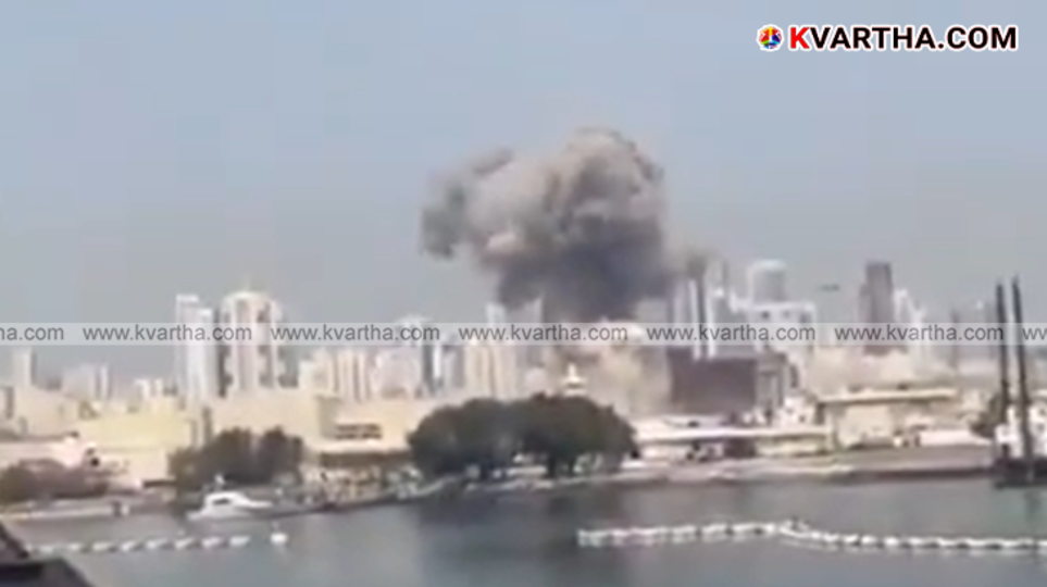  A damaged building with smoke in Iran following a missile strike.