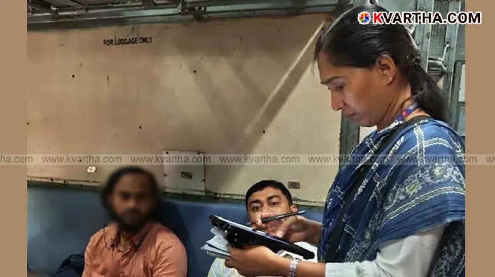 Indian railway officials checking tickets on the Shornur-Nilambur route.