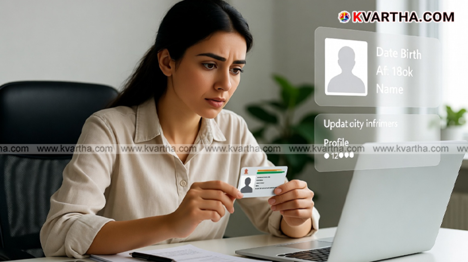  Close up of an Aadhaar card and a hand filling out a form