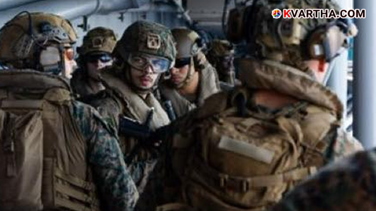 A representation of the US military build-up in the Middle East featuring a carrier strike group and soldiers in March 2026.