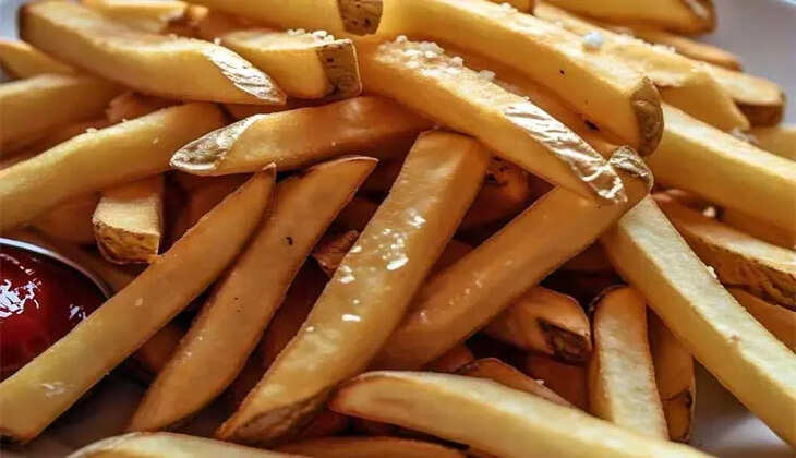 A woman in a courtroom, discussing a case related to French fries.