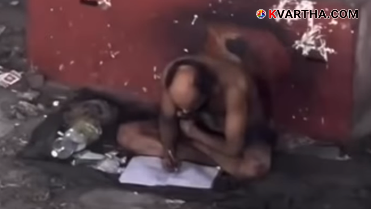  A viral video clip of a man studying next to a Delhi metro pillar.